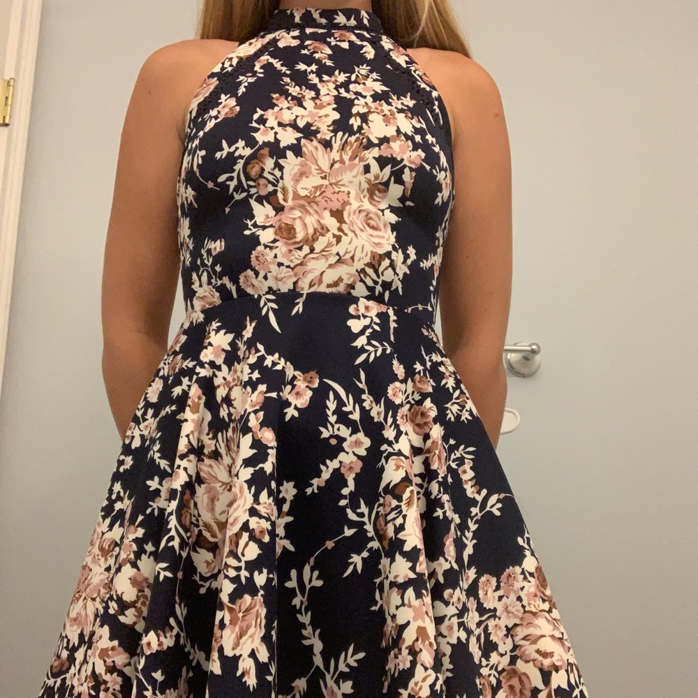 A navy/flowery dress from dillards, size five